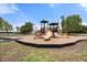 Community playground with climbing structures and slides, perfect for families at 6732 Washington Pl, Bradenton, FL 34207