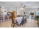 Bright dining room and kitchen with bar seating for casual dining at 7145 Mamouth St, Englewood, FL 34224