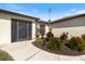 Beautiful front door entrance with decorative plants creating a warm, inviting appeal at 7145 Mamouth St, Englewood, FL 34224