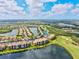 Wonderful aerial view of this condo, water and golf course at 7705 Grand Estuary Trl # 202, Bradenton, FL 34212