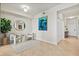 Inviting entry featuring artwork, tile flooring, and neutral decor, creating a welcoming atmosphere at 7705 Grand Estuary Trl # 202, Bradenton, FL 34212