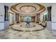 Opulent lobby with marble floors, grand columns, and sophisticated decor, creating a welcoming atmosphere at 7705 Grand Estuary Trl # 202, Bradenton, FL 34212
