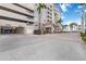 Community entrance with convenient garage access and elegant signage at 808 3Rd W Ave # 203, Bradenton, FL 34205