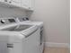 Laundry room featuring a side-by-side washer and dryer at 808 3Rd W Ave # 203, Bradenton, FL 34205