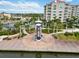 An aerial view of the Riverwalk entrance and surrounding condos highlights the vibrant waterfront community at 808 3Rd W Ave # 203, Bradenton, FL 34205