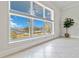 Stunning water view seen through large windows, enhancing the bright and airy ambiance of the space at 808 3Rd W Ave # 203, Bradenton, FL 34205