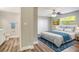 Comfortable main bedroom featuring an ensuite bathroom and closet at 8308 Pelican Rd, Englewood, FL 34224