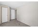 An empty bedroom with neutral-colored walls and carpet at 8414 Sweden Blvd, Punta Gorda, FL 33982