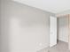 An empty bedroom with neutral-colored walls and carpet at 8414 Sweden Blvd, Punta Gorda, FL 33982