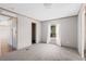 A bedroom with neutral-colored walls and carpet with a closet and ensuite bathroom at 8414 Sweden Blvd, Punta Gorda, FL 33982