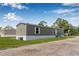 Charming single-story home with a well-maintained lawn and inviting front entrance at 8414 Sweden Blvd, Punta Gorda, FL 33982