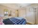 Bright, comfortable bedroom with plenty of storage and natural light at 9034 Midnight Pass Rd # 6, Sarasota, FL 34242