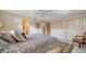 Large, well-lit bedroom features ample closet space and ensuite bathroom at 9034 Midnight Pass Rd # 6, Sarasota, FL 34242