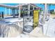 Pavilion area providing shade, with picnic tables and information displays about Siesta Key's history and environment at 9034 Midnight Pass Rd # 6, Sarasota, FL 34242