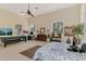 Open bedroom featuring a billiards table, workspace, and large windows with natural light at 95 Vic Edwards Rd, Sarasota, FL 34240