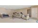 Versatile bonus room featuring a comfortable seating area, a bed, and flexible space for various activities at 95 Vic Edwards Rd, Sarasota, FL 34240