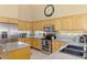 Granite counters complement stainless appliances in this well-equipped kitchen at 95 Vic Edwards Rd, Sarasota, FL 34240