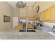 Well-lit kitchen boasting granite counters, stainless appliances, and custom cabinetry at 95 Vic Edwards Rd, Sarasota, FL 34240