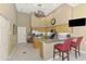 Modern kitchen features stainless steel appliances and an eat-in counter at 95 Vic Edwards Rd, Sarasota, FL 34240