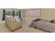 Spacious living room featuring a couch, glass coffee table, and a large blank projector screen at 95 Vic Edwards Rd, Sarasota, FL 34240