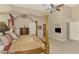 Bright main bedroom with a four-poster bed, walk-in closet, and decorative furnishings at 95 Vic Edwards Rd, Sarasota, FL 34240