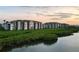 Condos with a water view surrounded by lush greenery at 1030 Tidewater Shores Loop # 404, Bradenton, FL 34208