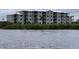 New condo construction featuring multiple units with water view at 1030 Tidewater Shores Loop # 404, Bradenton, FL 34208
