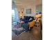 Comfortable living room features nice furniture, tile floors, and light from a large window at 1030 Tidewater Shores Loop # 404, Bradenton, FL 34208