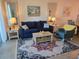 Living room with comfortable furniture and lots of natural light and tile floors at 1030 Tidewater Shores Loop # 404, Bradenton, FL 34208