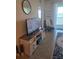 Cozy living room with TV and a water view from the window at 1030 Tidewater Shores Loop # 404, Bradenton, FL 34208