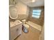 Beautiful bathroom featuring updated vanity, shower and tiles with natural light from the window at 1220 12Th W Ave, Palmetto, FL 34221