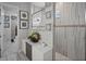 Luxurious bathroom featuring modern tile, glass shower, and decorative wall art at 12715 Wheatgrass Ct, Parrish, FL 34219
