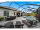 Outdoor living space showcasing an inviting pool, seating, and a spa at 12715 Wheatgrass Ct, Parrish, FL 34219