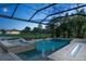 Inviting pool with a spa and a fire feature, surrounded by lush landscaping, perfect for relaxation at 13721 Saw Palm Creek Trl, Lakewood Ranch, FL 34211