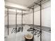 Walk-in closet featuring metal shelving and hanging rods for optimal storage organization at 1709 N Tamiami Trl # 318, Sarasota, FL 34234