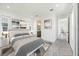Bright bedroom featuring neutral walls, carpet, and a ensuite bathroom at 172 Eagleston Ln, Sarasota, FL 34240