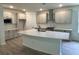 Spacious kitchen features a large island, stainless steel appliances, and modern cabinetry at 19575 Fort King Run, Brooksville, FL 34601