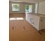 Spacious and bright living room with natural light, prepped for flooring installation and with rough-in plumbing at 19575 Fort King Run, Brooksville, FL 34601