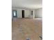 Large living area ready for finishes, featuring bright natural light and open spaces at 19575 Fort King Run, Brooksville, FL 34601