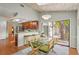 Eat-in kitchen features natural light, sleek countertops, and modern appliances, and a bright adjacent dining area at 2072 Misty Sunrise Trl, Sarasota, FL 34240