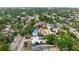 An elevated view shows the home nestled in a vibrant neighborhood near local amenities at 2120 8Th W Ave, Bradenton, FL 34205