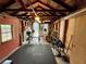 Garage with workout equipment, laundry machines, rubber floor, and work bench at 2120 8Th W Ave, Bradenton, FL 34205