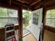 Inside the storage shed, showcasing a view through the open door to the yard at 2120 8Th W Ave, Bradenton, FL 34205