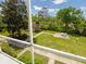 The backyard and garden area has well maintained landscaping and a seating area at 2155 Wood St # B18, Sarasota, FL 34237