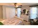 Cozy bedroom boasting a comfortable bed, closet, dresser, and an accent chair at 240 Patterson Ave, Osprey, FL 34229