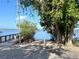 Scenic boat ramp with lush greenery and a clear view of the water at 240 Patterson Ave, Osprey, FL 34229
