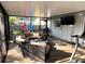 Enclosed patio with comfortable seating, perfect for relaxation and entertainment at 240 Patterson Ave, Osprey, FL 34229