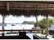 Scenic view from a waterfront bar with boats dotting the calm blue water at 240 Patterson Ave, Osprey, FL 34229