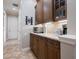 Classic butlers pantry featuring plenty of cabinets and counterspace at 26725 Raphis Royale Blvd, Englewood, FL 34223