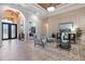 Inviting living room with elegant decor, decorative columns, and stylish furniture arrangement at 26725 Raphis Royale Blvd, Englewood, FL 34223